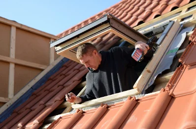 Pose de fenêtres de toit Velux au Fête
